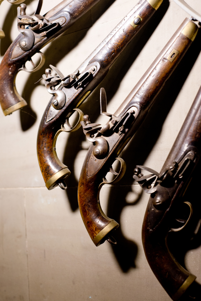 A display of flintlock pistols