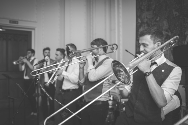 A black and white image of a brass band.