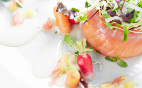 A salmon starter with baby vegetables