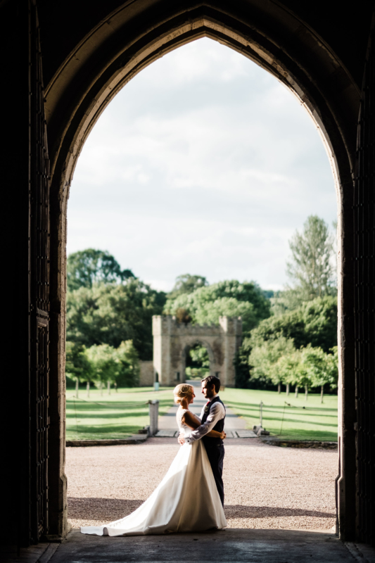 Couple in drawthrough with driveway behind