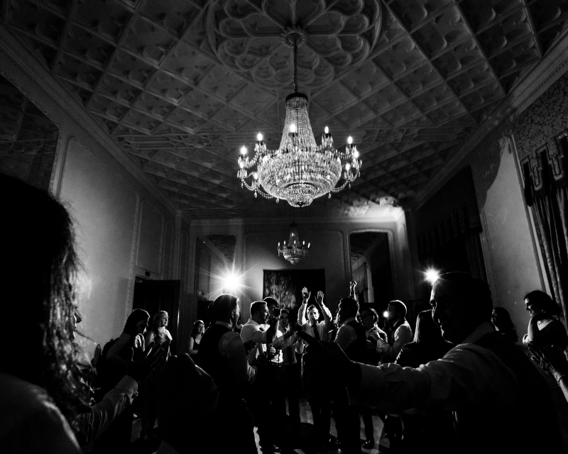 Black and white image of people dancing in the ballroom.