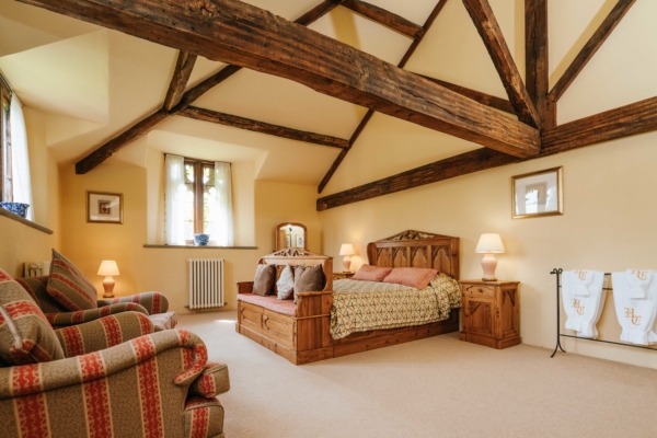 Beautiful attic bedroom with wooden beams